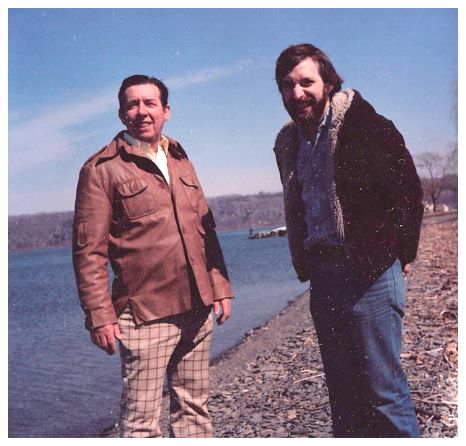 1986 - Rob with son Garry on the shores of beautiful Cayuga Lake, Ithaca, NY. Must have gotten a deal on the plaid-paints-with-sporty-jacket ensemble.jpg